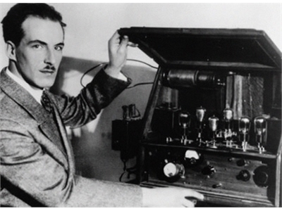 Leon Theremin with his invention